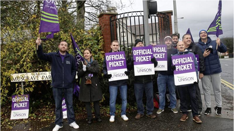 Unison members on strike outside Musgrave Park Hospital in Belfast yesterday. Picture by Hugh Russell 