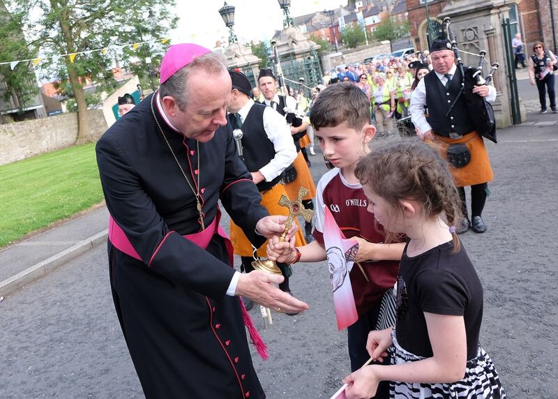 Archbishop Eamon Martin with PJ and Aine O'Hare who carried the relic of St Oliver Plunkett to St Patrick's Cathedral. Picture by LiamMcArdle.com