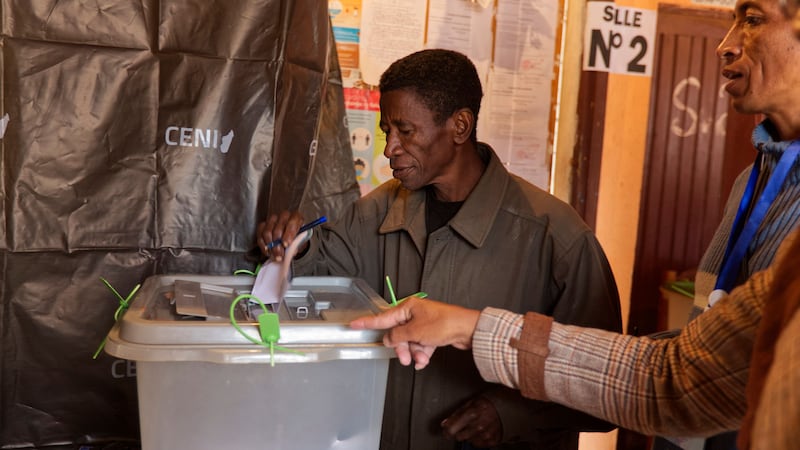 A man casts his vote in the presidential election in Antananarivo (Alexander Joe/AP)