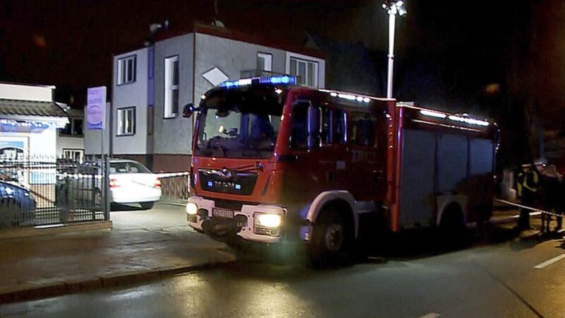 A fire engine stands outside an escape room game location in Koszalin, northern Poland, on Friday, January 4 2019. A fire broke out at the escape room, killing five teenage girls and injuring a man, authorities said. Picture by Associated Press