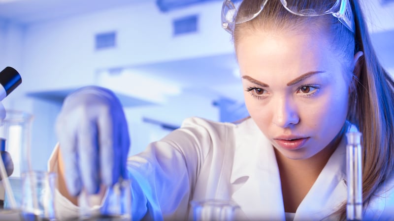 Young scientist in working laboratory
