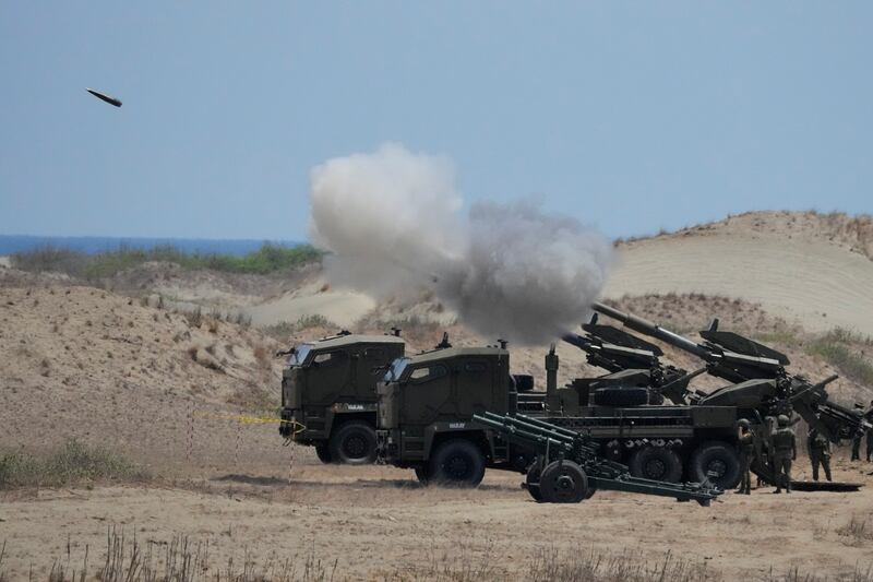 Philippine Army fires Atmos 155mm howitzers during the joint military exercise (Aaron Favila/AP)