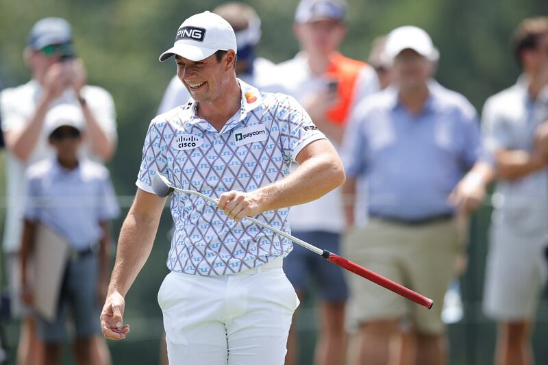 Viktor Hovland smiles before putting on the first green during the first round of the Tour Championship at East Lake Golf Club (Alex Slitz/ AP)