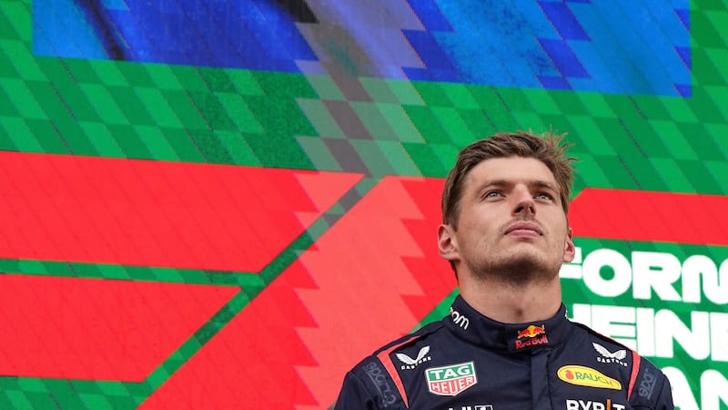 Red Bull’s Max Verstappen on the podium after winning the Dutch Grand Prix (Tim Goode/AP)