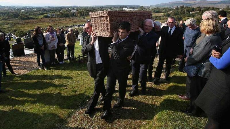 The funeral of playwright Brian Friel takes place at Glenties Cemetery in Co Donegal. Picture by Niall Carson, Press Association 