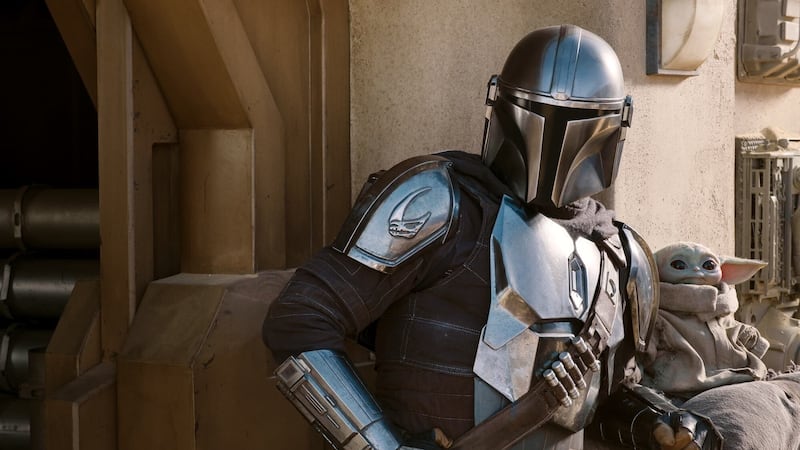 Helmeted hero Din Djarin is reunited with his little green friend as the pair journey to his ancient home of Mandalore.