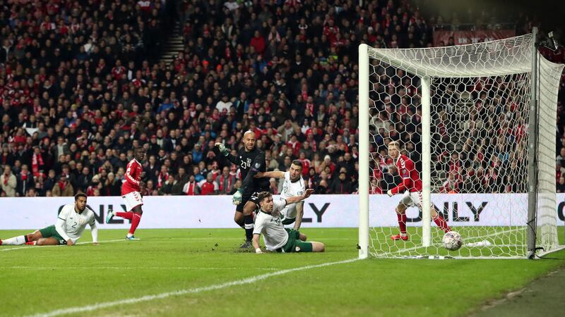 Republic of Ireland keeper Darren Randolph watches as Denmark's Pione Sisto's shot (second left) goes very close to opening the scoring during the FIFA World Cup qualifying play-off first leg match at the Parken Stadium, Copenhagen.