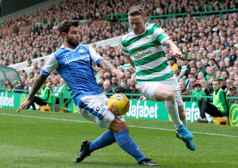 Celtic's Jonny Hayes and St Johnstone's Richard Foster (left)battle the ball during the Ladbrokes Scottish Premiership match at Celtic Park, Glasgow on Saturday August 26 2017