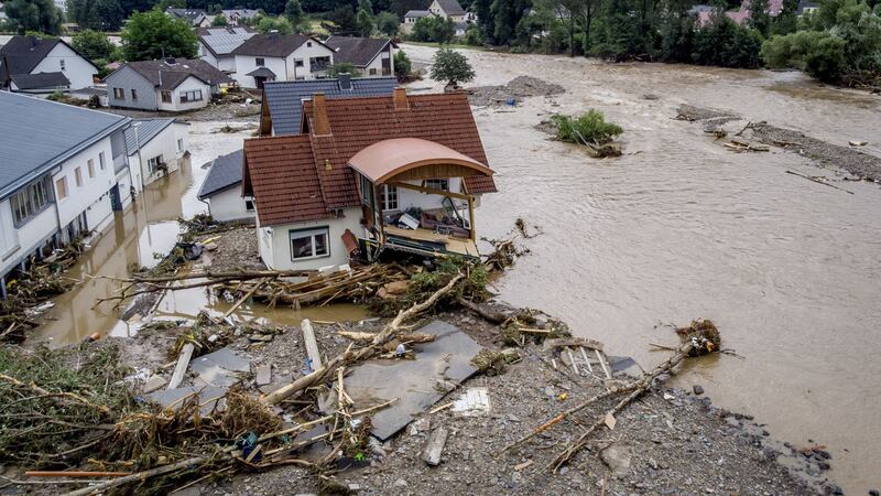 A damaged house is seen at the Ahr river in Insul, western Germany, Thursday, July 15, 2021 (AP Photo/Michael Probst)&nbsp;