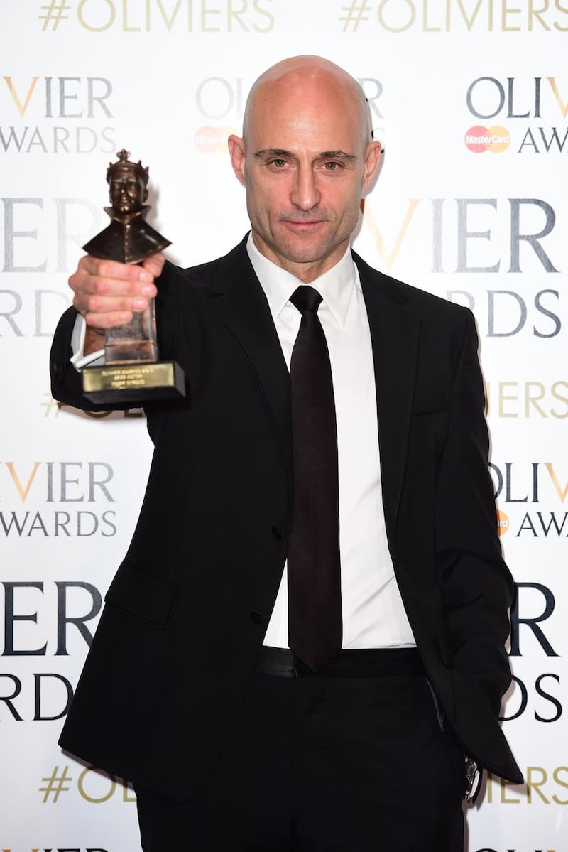 Mark Strong with the Olivier Award for best actor