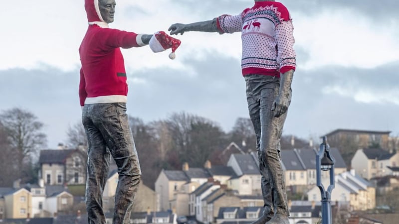 Derry&#39;s Hands Across the Divide Statue prepares for tomorrow&#39;s world record Christmas jumper bid.  