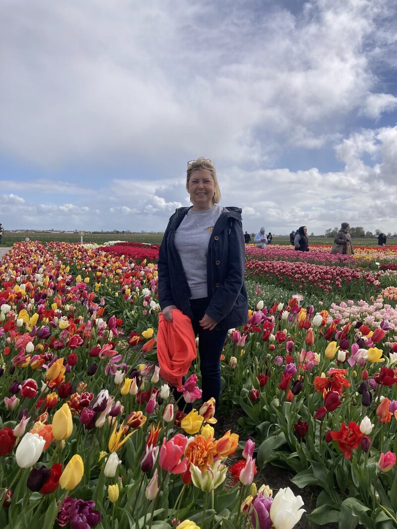 Alison Kershaw in the tulip show garden at Tulip Experience Amsterdam.