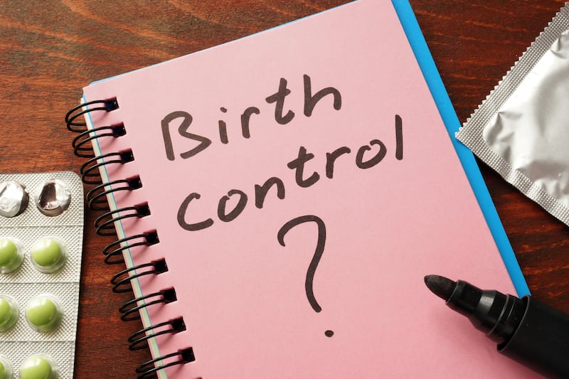 A book with birth control written on it 