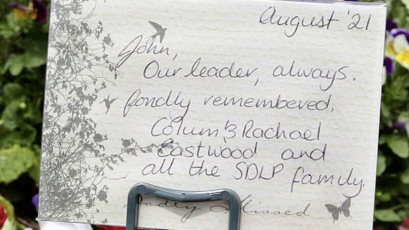 Flowers left by SDLP leader Colum Eastwood and family on the grave of John Hume. Picture by Margaret McLaughlin 