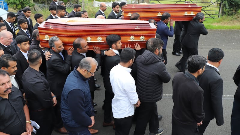 The coffins of Reuven Simon and Joseph Sebastian are brought from St Mary's Church in Ardmore, Co Derry, following their funeral. The 16-year-olds died after getting into difficulty while swimming at Lough Enagh. Picture by Joe Boland, Press Association