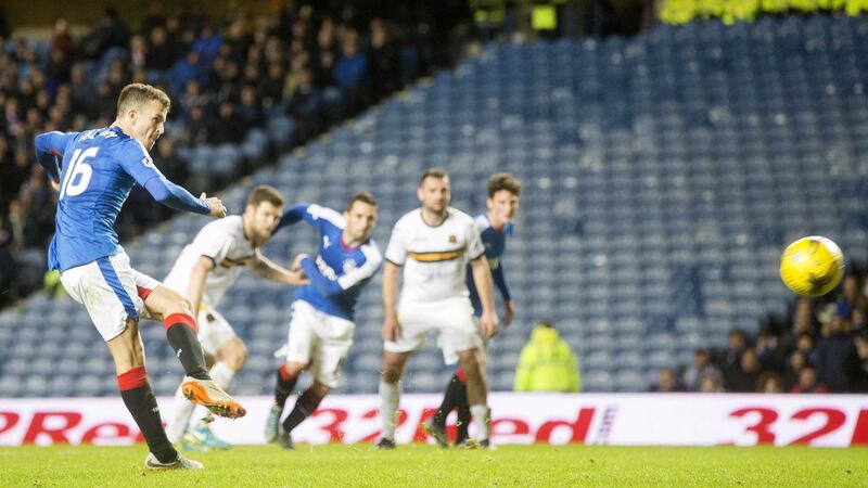 Rangers' Andrew Halliday scores his side's fourth goal during the Ladbrokes Championship match against Dumbarton at Ibrox on Tuesday<br />Picture by PA&nbsp;