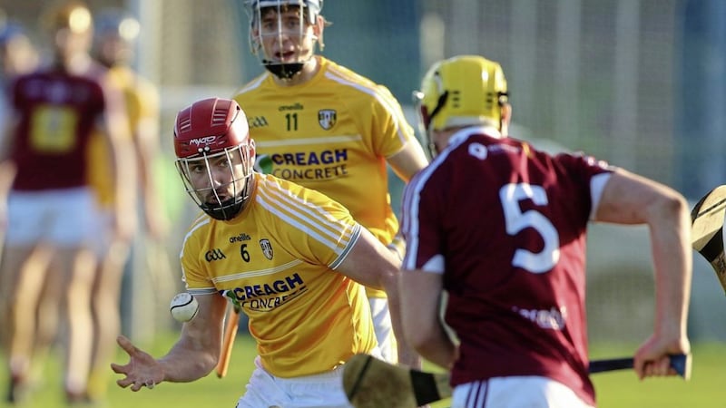 Simon McCrory of Antrim in action as Westmeath&rsquo;s Aaron Craig prepares to challenge during Sunday&#39;s Allianz Hurling League Division 2A match at Corrigan Park Picture by Cliff Donaldson 