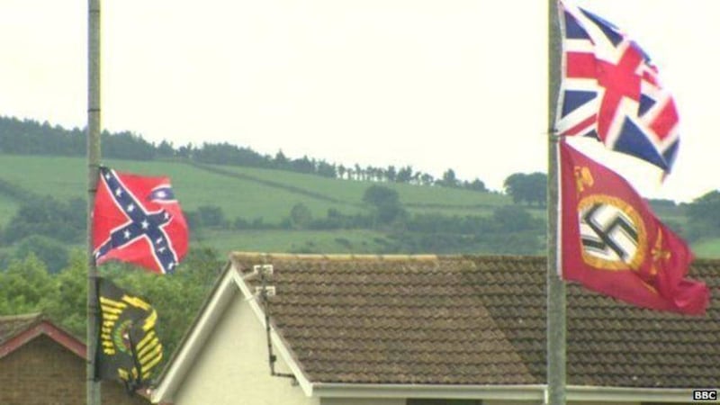 Nazi and a Confederate flag put up by loyalists in Carrickfergus have been removed 