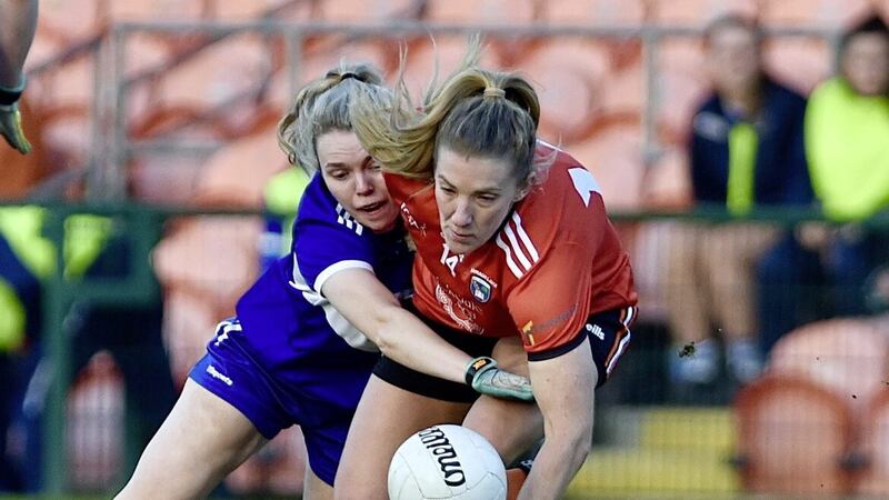 Armagh&rsquo;s Kelly Mallon takes possession ahead of Sarah Ann Fitzgerald of Laois during Sunday&rsquo;s clash between the sides Picture by John Merry 