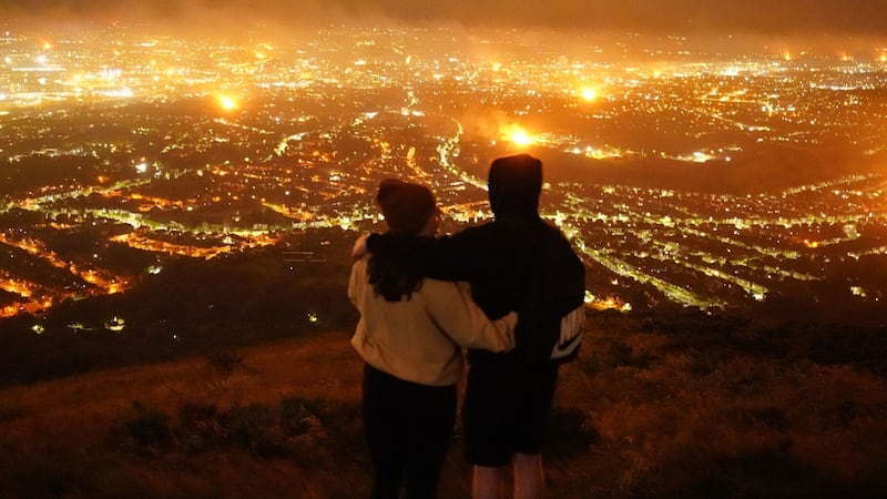 A view from Cavehill overlooking Belfast city of loyalist bonfires burning as part of the traditional Twelfth commemorations