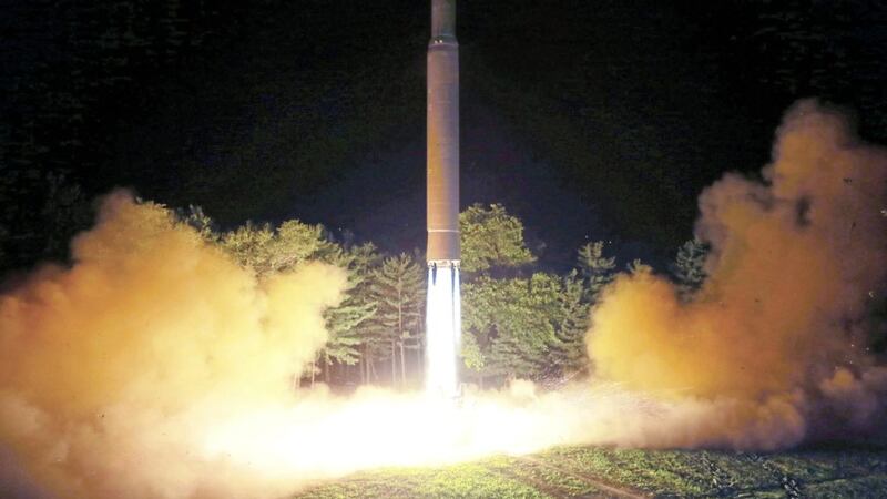 Photo distributed by the North Korean government shows what was said to be the launch of a Hwasong-14 intercontinental ballistic missile at an undisclosed location in North Korea 