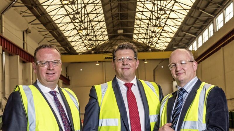 Manufacturing NI chief executive, Stephen Kelly is pictured with The Momentum Group managing director, Tom Verner and business development manager of Cimpina, Paul Hamilton 