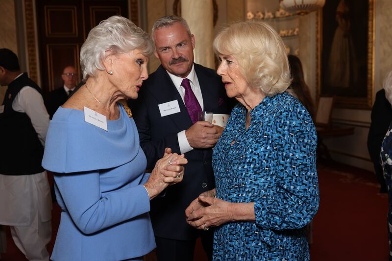 Camilla speaks to Angela Rippon during the reception at Buckingham Palace