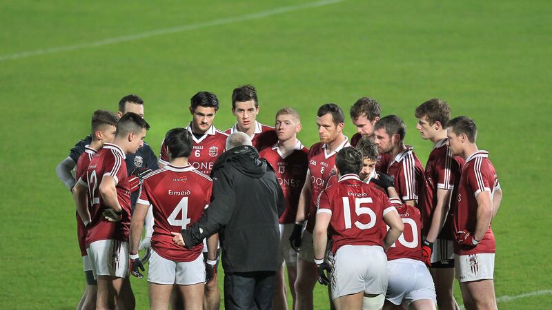 <span style="font-family: Arial, sans-serif; ">Slaughtneil manager Mickey Moran talks to his team before their semi-final against Kilcar. Picture Margaret McLaughlin</span>