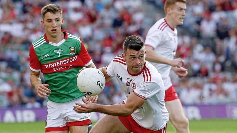 Tyrone&#39;s Darren McCurry and Mayo&#39;s Enda Hession  in action during the GAA Football All-Ireland Senior Championship Between Tyrone and Mayo at Croke Park Dublin 09-11-2021. Pic Philip Walsh 