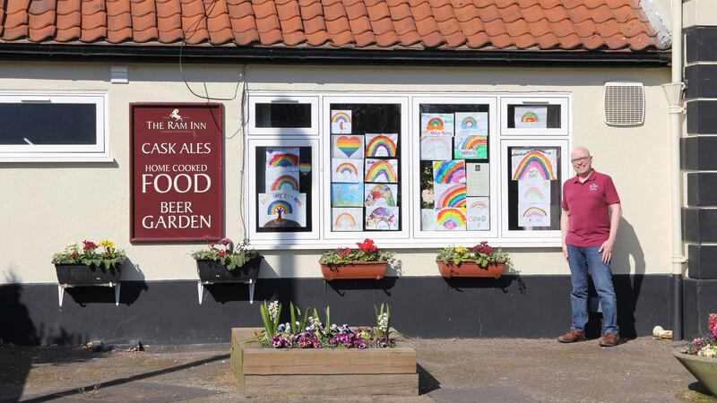 The windows at The Ram Inn have been filled with artworks to raise money for a hospital.