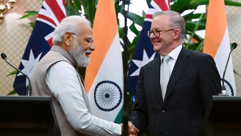India’s Prime Minister Narendra Modi, left, shakes hands with Australian Prime Minister Anthony Albanese (Dean Lewins/Pool/AP)