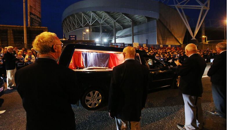 Crowds line the street as a hearse carrying the coffin of Shannon and Munster Rugby club's head coach Anthony Foley passes Thomond Park stadium in Limerick.&nbsp;Niall Carson/PA Wire&nbsp;