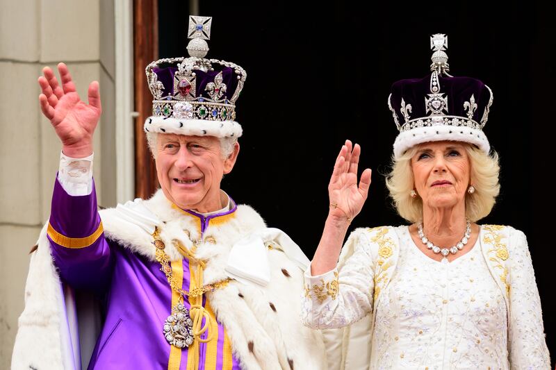 The King and Queen on the balcony of Buckingham Palace following the coronation ceremony
