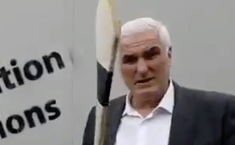 A bizarre video featuring MEP candidate Ben Gilroy smashing white boards with a hurl has gone viral on social media 
