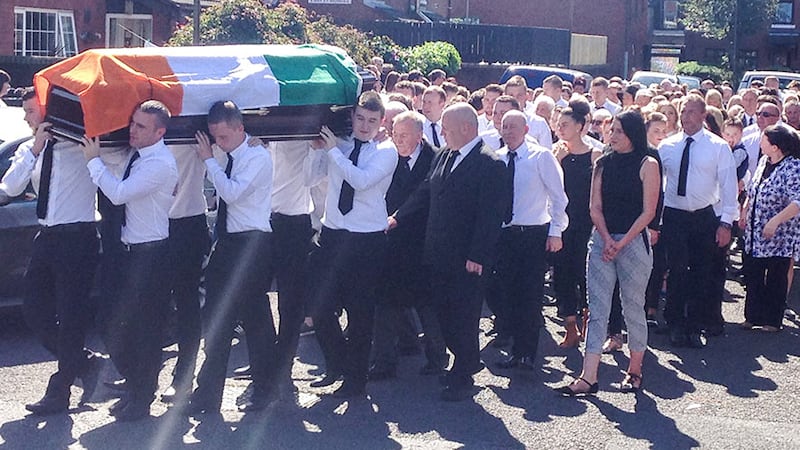 <span style="font-family: Arial, Verdana, sans-serif; ">The funeral of Kevin McGuigan makes its way to St Matthew's Church in east Belfast</span>