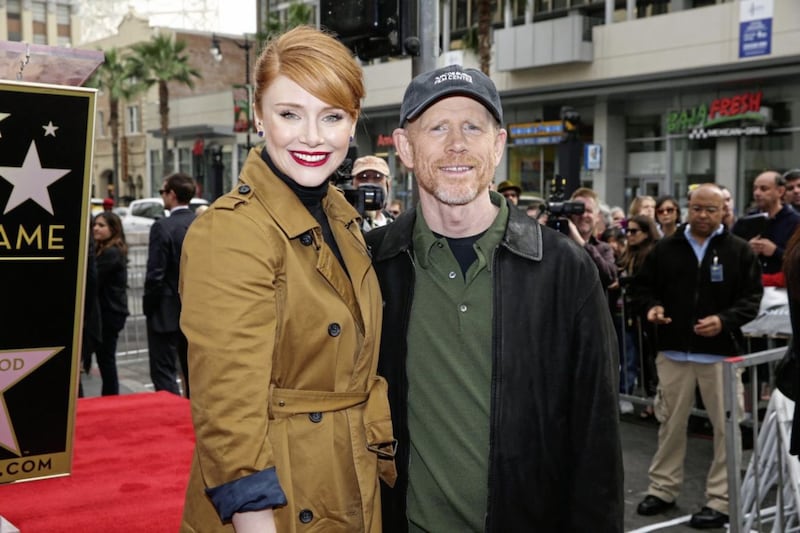 Bryce Dallas Howard and her dad Ron Howard on the Hollywood Walk of Fame in 2015 
