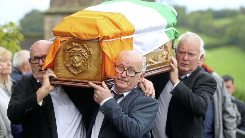 The McAnespie family carry their father&#39;s coffin into St Mary&#39;s Church Aughnacloy, Co Tyrone. Picture Mal McCann. 