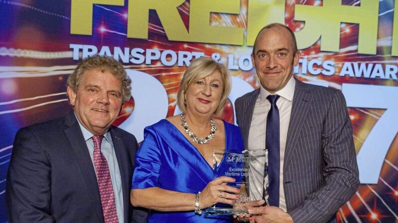 Anna Breen, Stena Line&rsquo;s freight commercial manager receives the award for Excellence in Maritime Logistics from Chris Polwart, sales director, Motis (right) and event compare Adrian Logan 