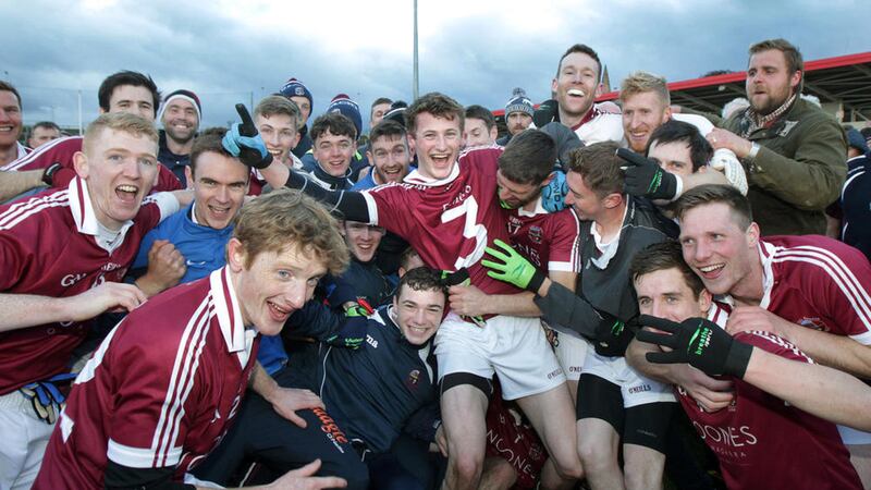 Brendan Rogers (centre) leads the Slaughtneil celebrations after last Sunday's Derry SFC final win over Loup <br />Picture by Margaret McLaughlin