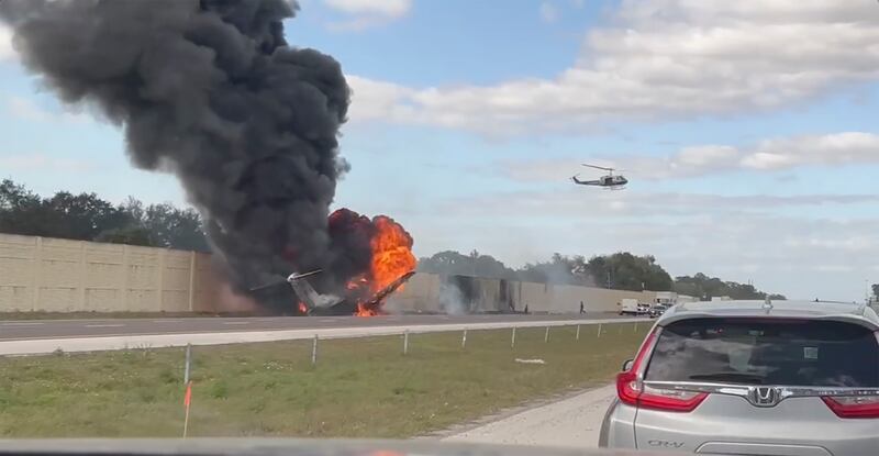 The plane crashed on the Interstate 75 road (Chris O’Conner via AP)