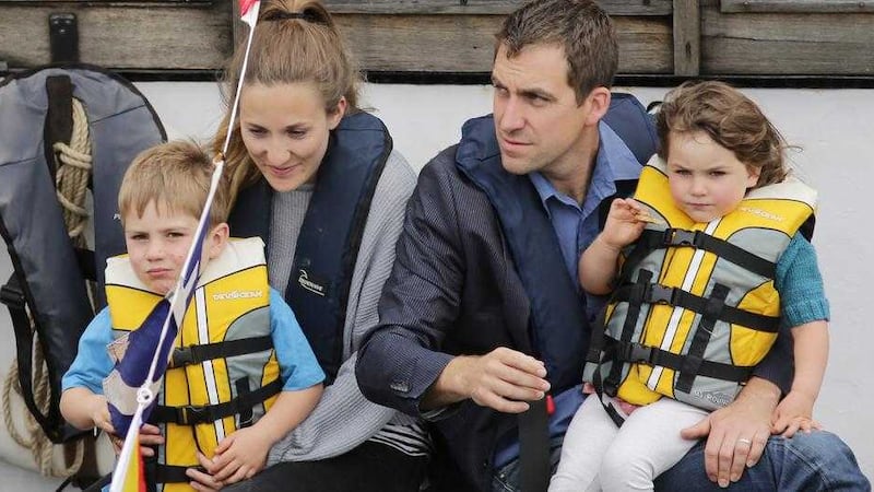 MEMORIAL: Brendan Cox, the widower of Labour MP Jo Cox, and their children Cuillin and Lejla, and an unidentfied woman make their way along the River Thames to Westminster         PICTURE: Daniel Leal-Olivas/PA 