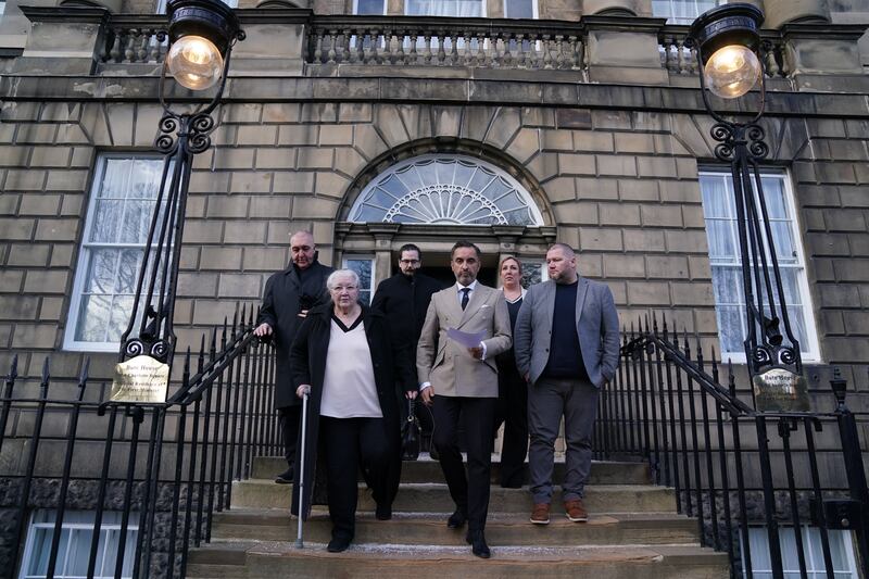 Margaret Caldwell (left), mother of murder victim Emma Caldwell and lawyer Aamer Anwar (centre) and other family members, outside Bute House