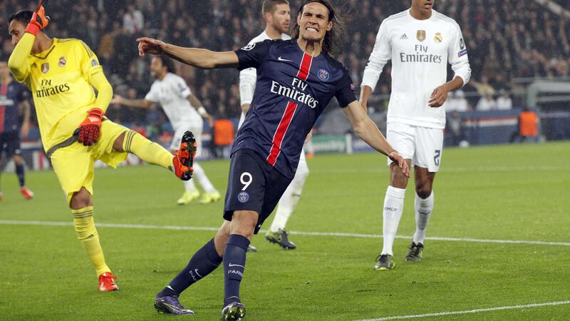 PSG's Edinson Cavani shows his frustration after missing a chance against Real Madrid during Wednesday night's Champions League Group A match at the Parc des Princes in Paris<br />Picture: PA