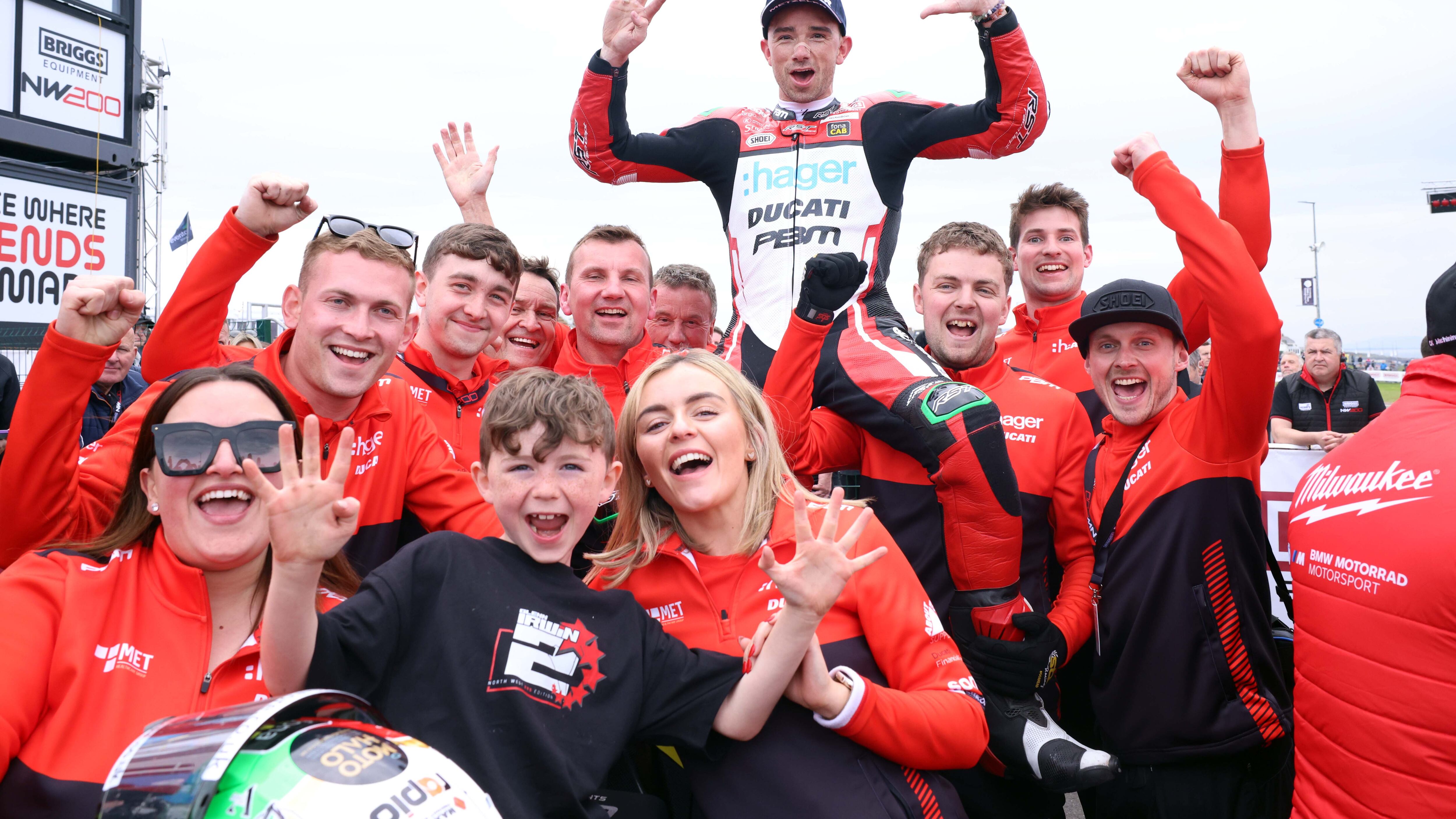 Glenn Irwin wins his ninth Superbike race in a row during the first evening of the NW200. He is congratulated son Freddie and his Ducati team.
Picture: Stephen Davison/Pacemaker Press