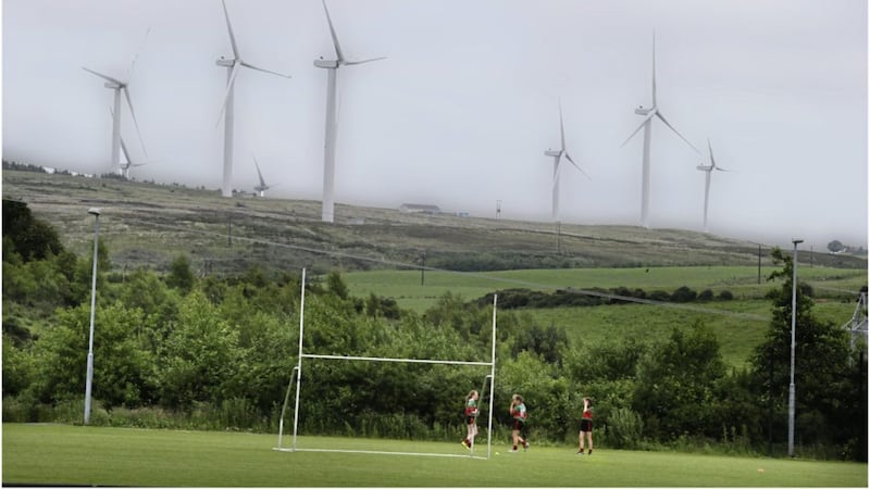 The Slieve Divena wind farm next to Tyrone GAA&#39;s headquarters in Garvaghey, which has been acquired by Greencoat UK. Picture by Hugh Russell. 