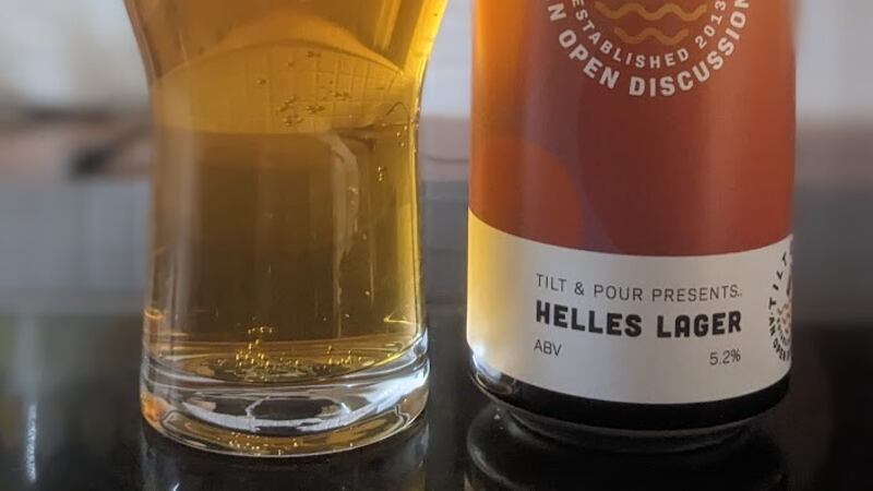 With can art by Warren Curry Design, Tilt & Pour's Helles Lager was brewed at Heaney's Brewery in Bellaghy