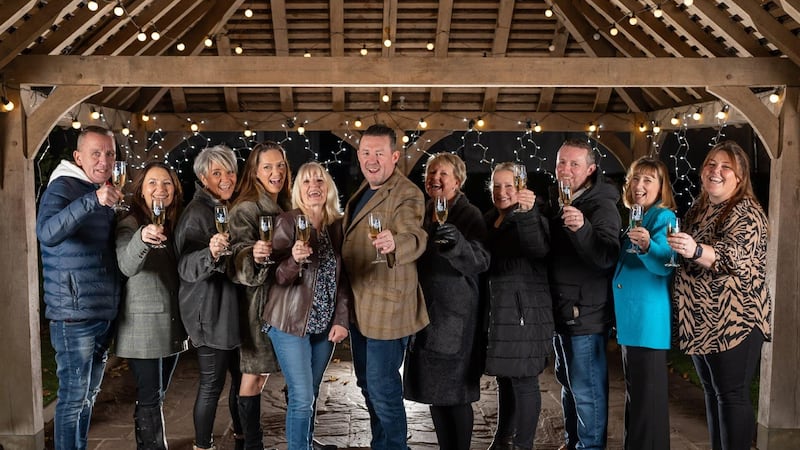 Members of the EuroMillions syndicate at the Ye Olde Bell near Retford are celebrating sharing a £1m win (Camelot UK/PA)