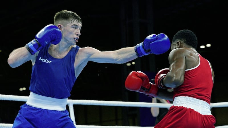 Northern Ireland&#39;s Jude Gallagher (Blue) and Comfort Zweli (Red) in the Men&#39;s Featherweight (54-57kg) last 32 bout at The NEC on day two of the 2022 Commonwealth Games in Birmingham Picture: Peter Byrne/PA 