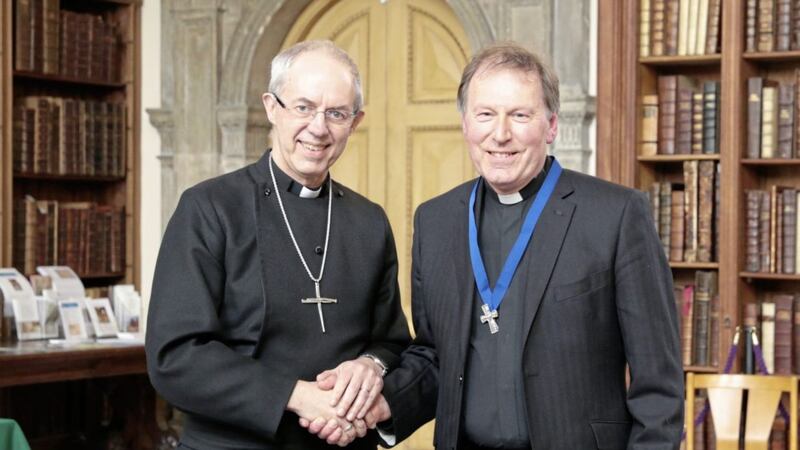 The Archbishop of Canterbury, Justin Welby, with the former Dean of Belfast, Rev John Mann 