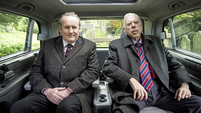 Martin McGuinness (Colm Meaney) hitches a ride with Ian Paisley (Timothy Spall) in The Journey 